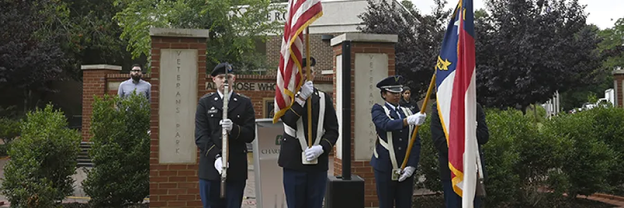 Memorial Day Service 2020 with four color guard members holding flags